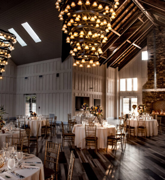 Custom coffered ceiling chandeliers at Ryland Inn