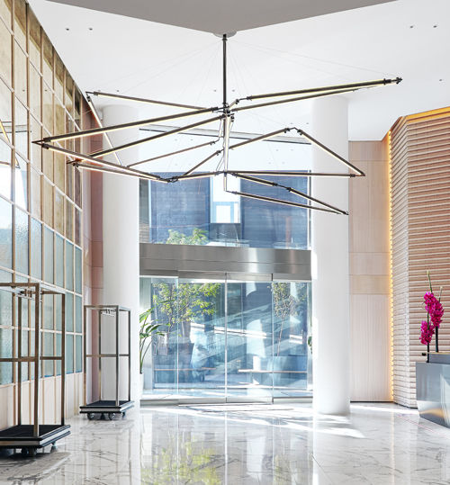 Isotope custom chandelier in the lobby of The William Vale Hotel, Brooklyn NY